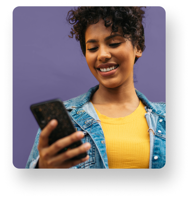 Official Marqeta photograph of a customer using a smartphone